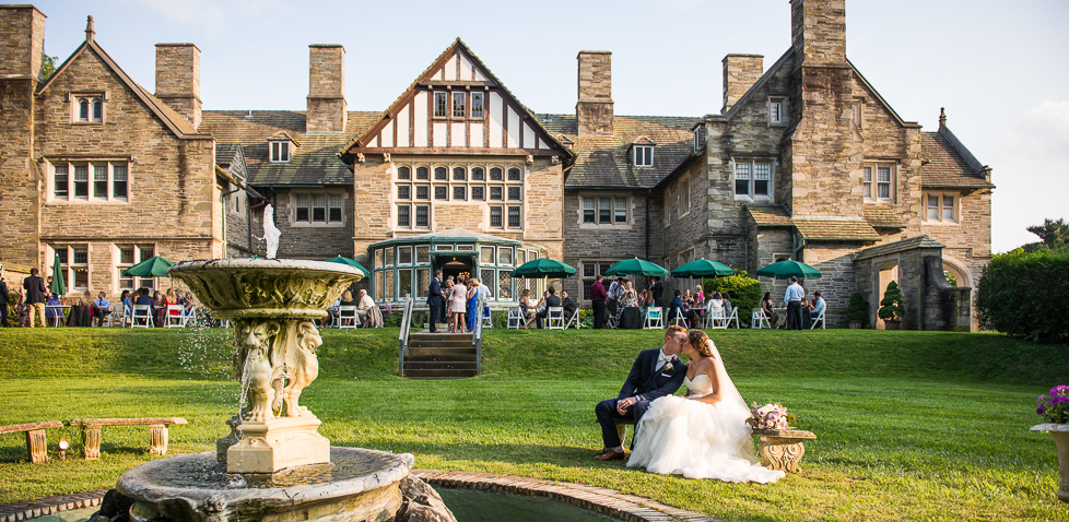 Summer Wedding Portrait With Gorgeous Venue In Background By Lehigh Valley Wedding Photographer