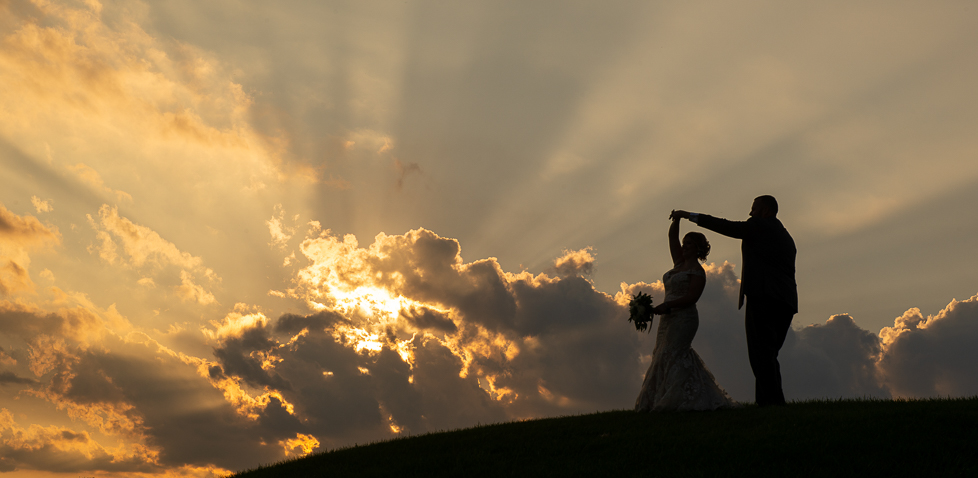 Bride And Groom Dance As The Sun Sets Captured By Emmaus Wedding Photographer